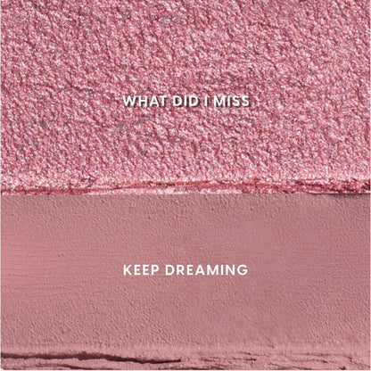 Heart to Get Love At First Swipe Shadow Stix swatches showing two pink shades, a shimmering rose labeled “What Did I Miss” above a matte mauve labeled “Keep Dreaming,” displayed in a close-up textured grid for US makeup shoppers.