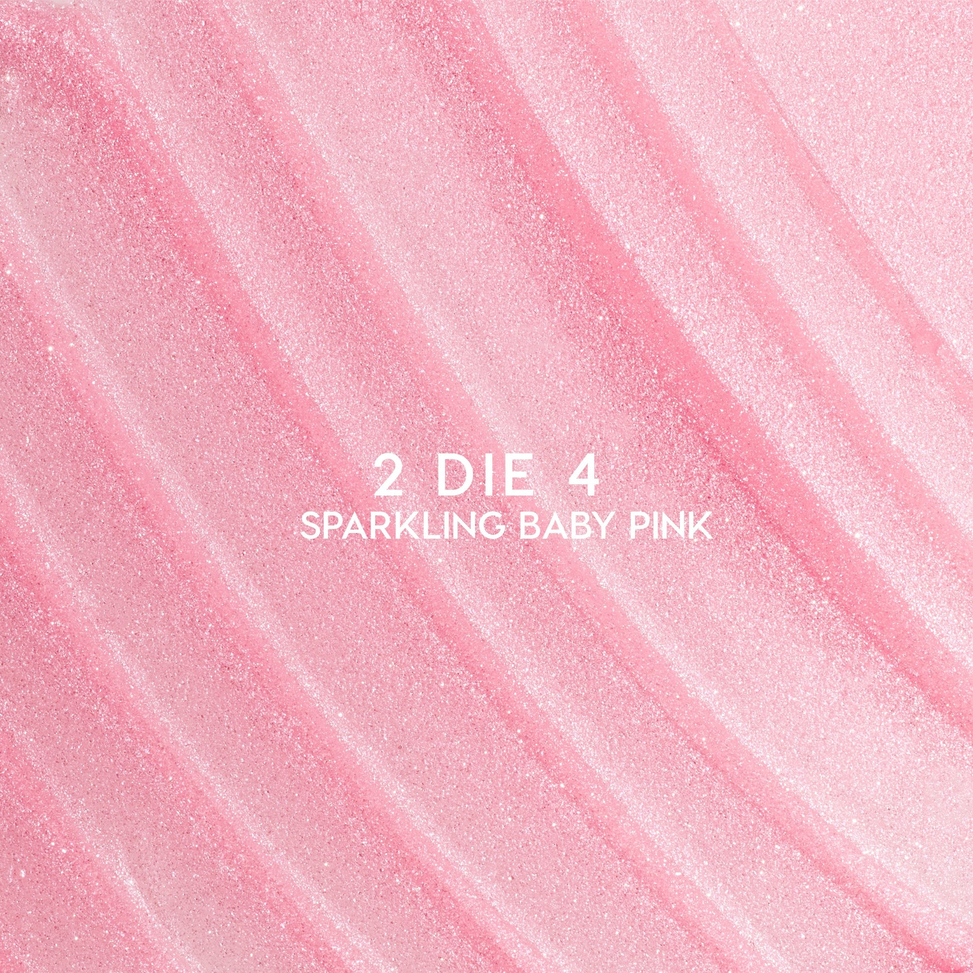 Heart to Get 2 Die 4 ultra glossy lip swatch showing sparkling baby pink shimmer in diagonal, textured streaks against a smooth pastel background, highlighting the high-shine, glittery finish for US makeup lovers.