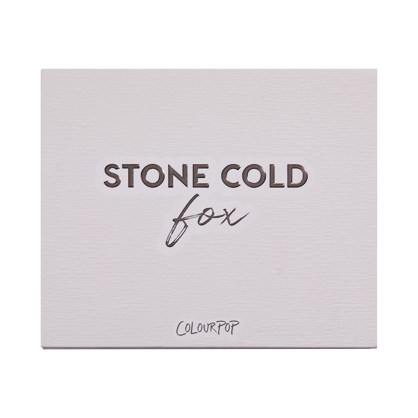 Stone Cold Fox shadow palette shown closed, featuring embossed “STONE COLD fox” lettering on a pale taupe faux-leather cover with ColourPop logo, studio-lit on a white background; a sleek neutral ColourPop Shadow Palette packaging shot.